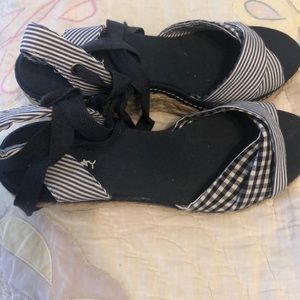 Never been worn navy tie up heeled sandals!